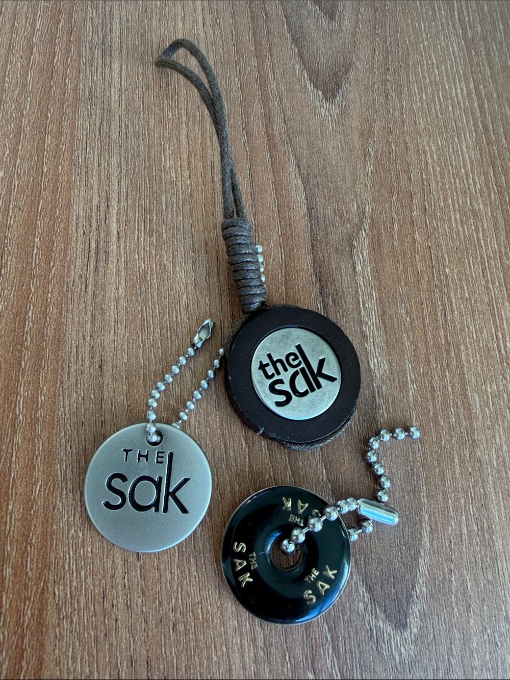 The Sak Sakroots Bag Charms Hangtags Set of 3 Leather Metal Silver Brown